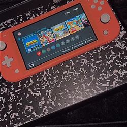 Pink Nintendo Lite With Memory Card And Games 