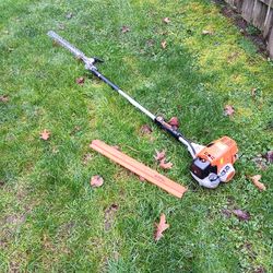 stihl hedge trimmer model HL100 K with 22" blade and it folds up runs great