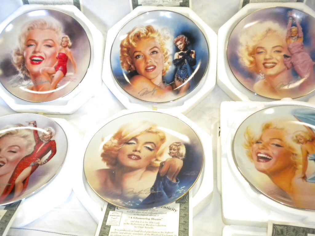 Marilyn Monroe collector’s plates &statue