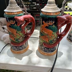 $75-Bundle 3- Very Nice Tall German Stein’s blue one is musical/pick up off Blanco Road