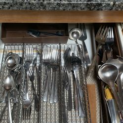 Assortment of silverware and knives