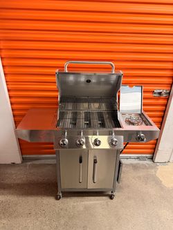 4 burner GAS Grill with side burner, storage cabinet, and casters NEVER USED!