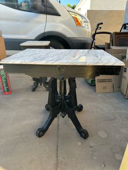 Various side tables with marble tops