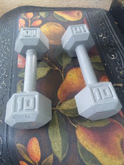 Two 10 pound dumb bells