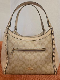 Coach Kristy Shoulder Bag in Light Khaki/Chalk signature canvas.
