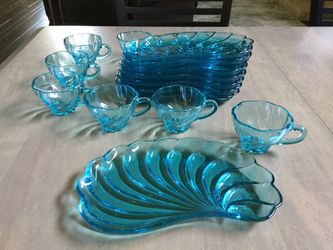 Blue glass cups and plates