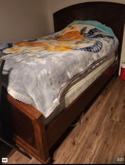 bed frame with a headboard and footboard.