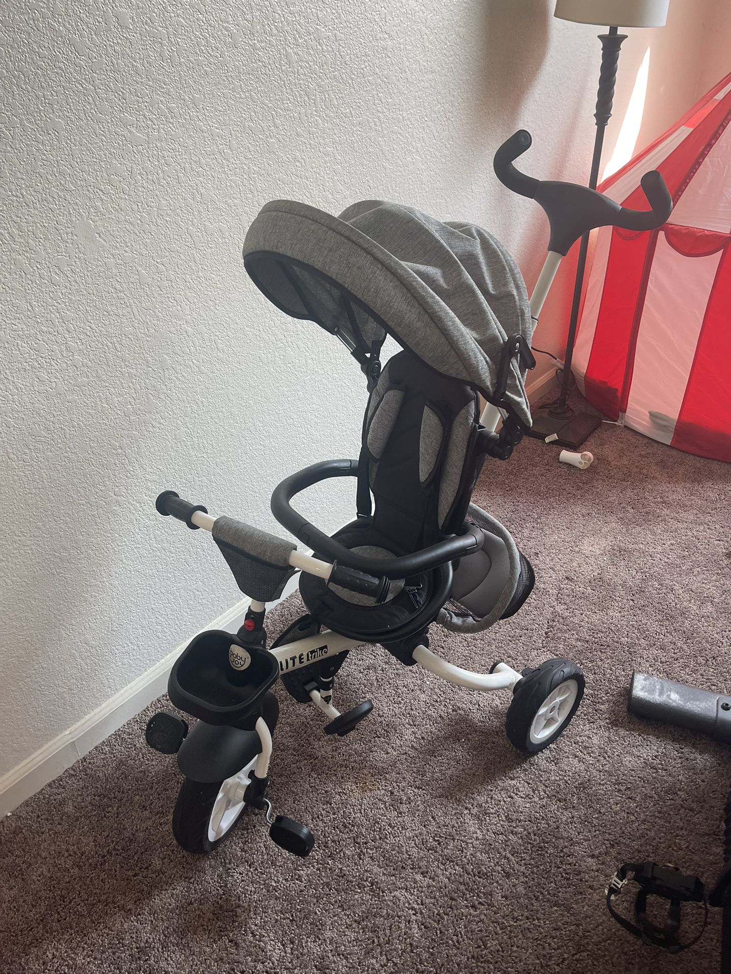 4-1 Stroller Converts to a  Stand Alone Tricycle (Up to age 8)  