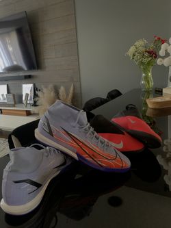 2 pairs of Nike indoor cleats