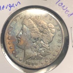 Beautiful New Orleans mint toned Morgan silver dollar 