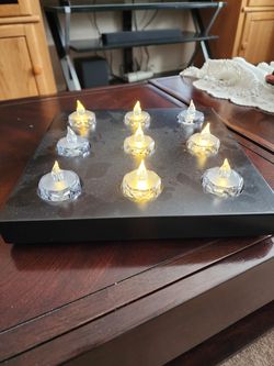 Partylite 9 slot candle holder. Battery operated candles included