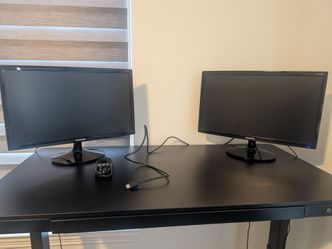 Used good condition Samsung S22D300HY 21.5-inch LED monitor with a textured black back panel