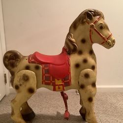 A vintage antique Mopo bronco collectible 