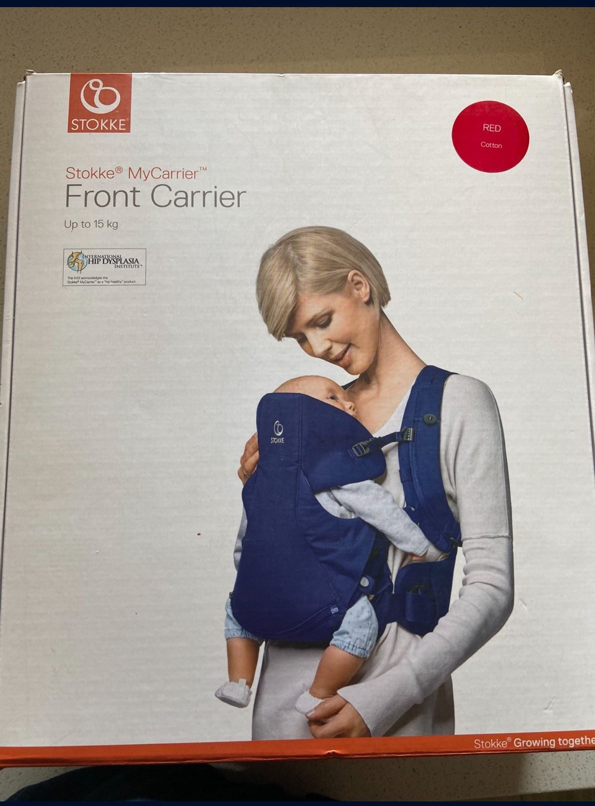 RED color Stokke MyCarrier Front Carrier