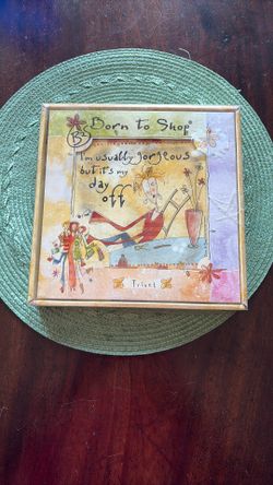 2 Born To Shop Trivet’s. New Still In Original Package. Bought for a gag