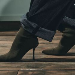 Zara size 9 Fabric black ankle boot. Easy pull-on closure. High stiletto heel. Pointed toe.