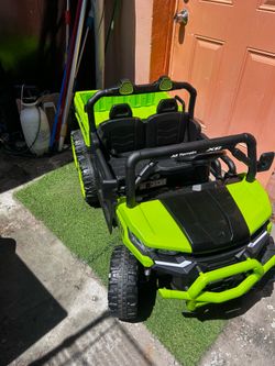 TCARAIWEN 24V 2-Seater ride-on dump truck features 6 wheels