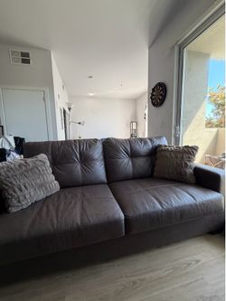 Pull Out - Brown Leather Couch