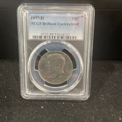 1977 D Brilliant Uncirculated Kennedy Half Dollar Graded By PGCS O-12