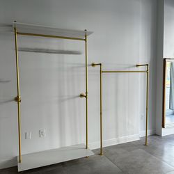 Two sets of clothes racks