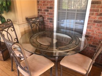 Glass top kitchen table and four chairs