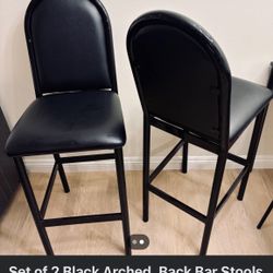 Set Up Two Black Leather Chairs