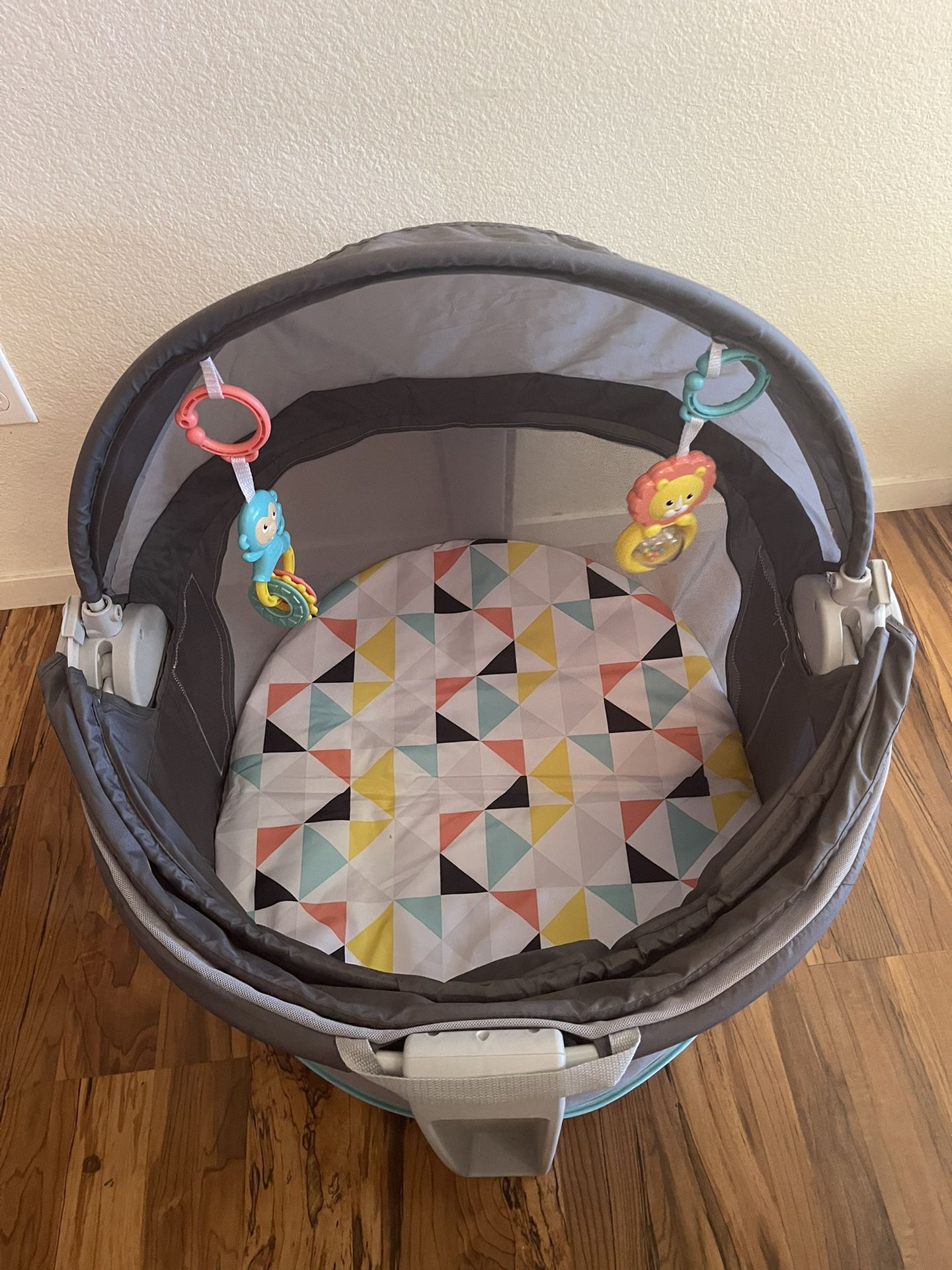 Fisher-Price Portable Bassinet and Play Space On-the-Go Baby Dome with Developmental Toys and Canopy
