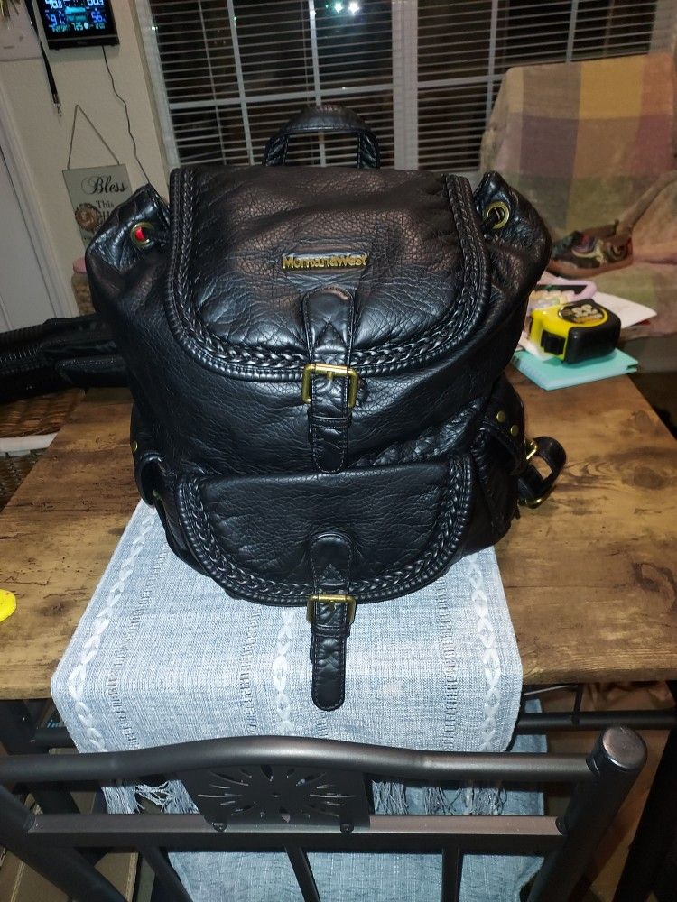 LEATHER BACKPACK/ CARRY BAG