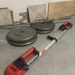 4x 50 Lb Plates And Curl Bar And A Iron Chest Master