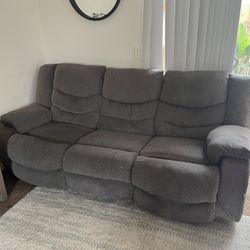 grey recliner sofa / couch