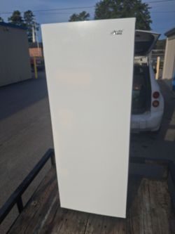 Newer upright freezer or refrigerator for your garage