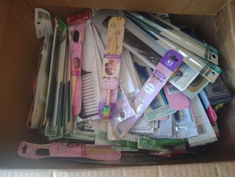 Large box of picks and combs take all