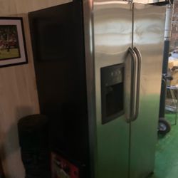 Refrigerator/ silver and black