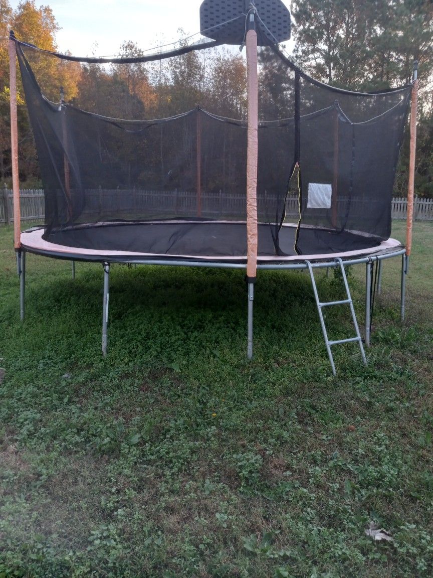 Trampoline And Swing Set