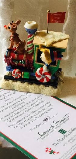 Collectible “Rudolph Will You Guide Our Sleigh Tonight” From The Rudolph the Red-Nosed Reindeer Christmastown Express Collection. Comes with Certific