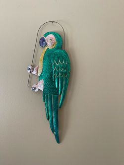 Tin parrot wall art