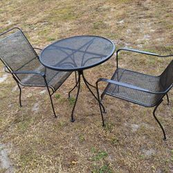 Table And Two Chairs 