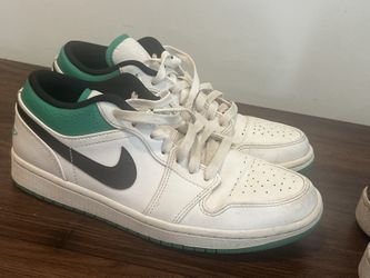 Two Nikes, One Pair Of Vans.