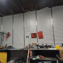 Garage Shelves Glass Walls Hangers Black Cabinets And Metal Tops 30 Feet 