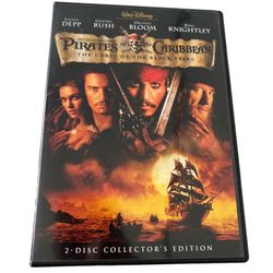 Pirates of the Caribbean: The Curse of the Black Pearl (DVD, 2003)  This Pirates of the Caribbean DVD was released in 2003 and features Johnny Depp, O