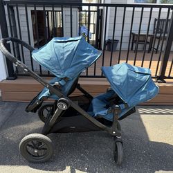 Double stroller with bassinet and car seat