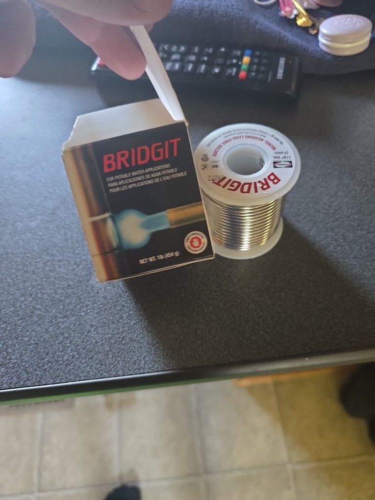 Lead free rigid nickel bearing solder