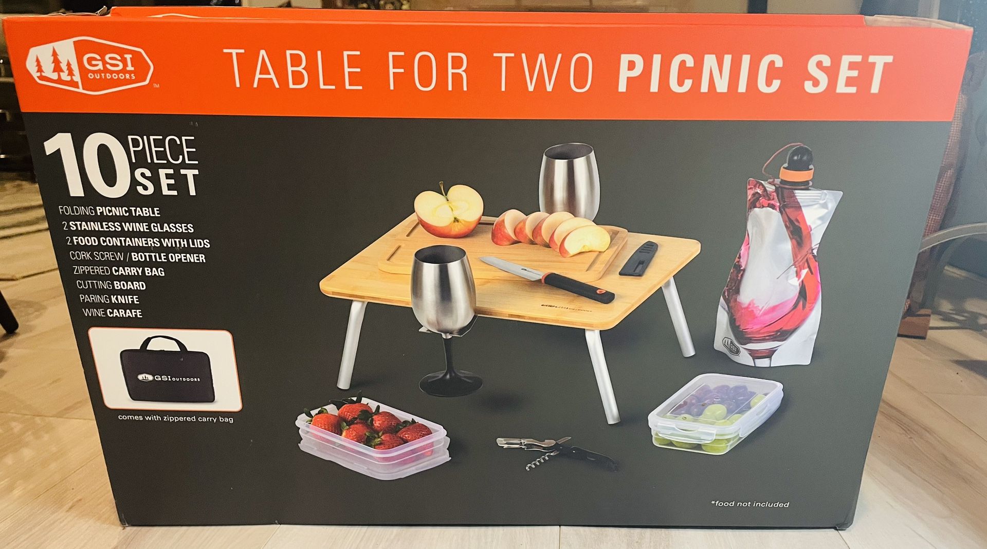 GSI Outdoors Table for Two Picnic Set, which includes a variety of items for outdoor dining.