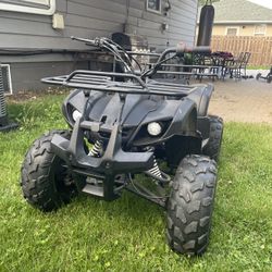 Coolster kid Four wheeler 125cc(goes reverse)