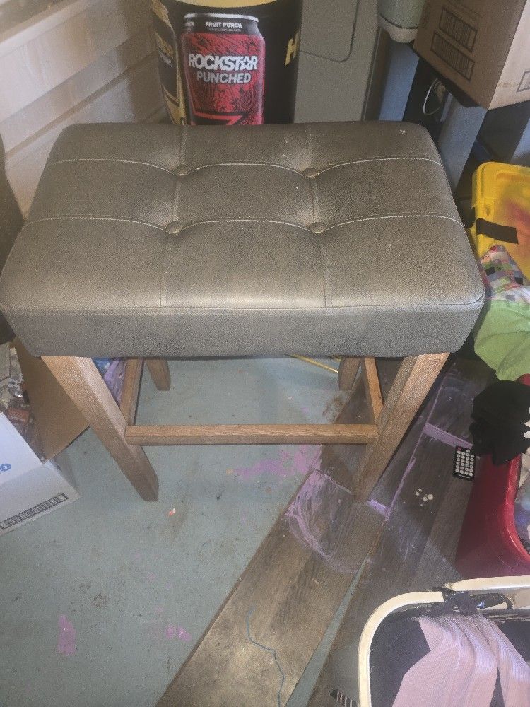 High wooden bar stool with cushion