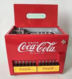 Vintage 1990's coca cola die cast table top battery operated cooler style musical vending machine plays jingle tune like new perfect never used locate