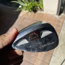 56 deg wedge Taylormade rac in left hand , steel 