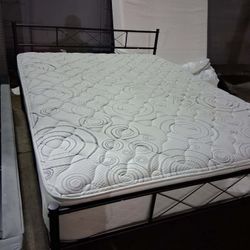 Beautiful metal queen size bed frame with mattress
