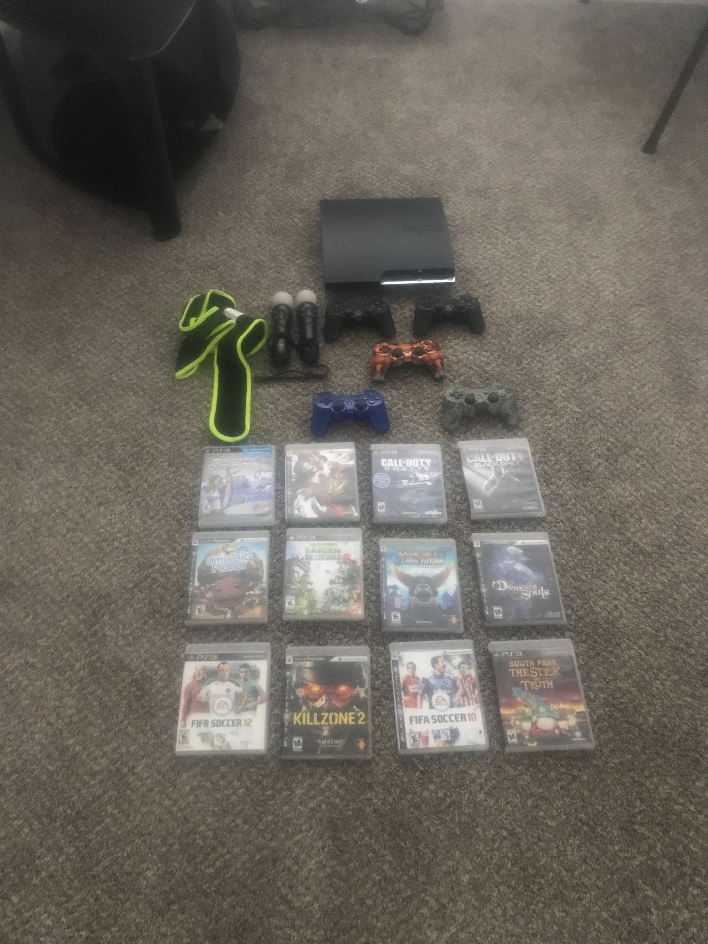 PS3 Slim with 14 games and 5 controllers