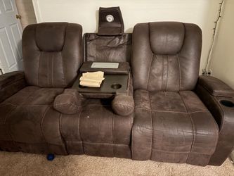 Brown leather recliner sofa